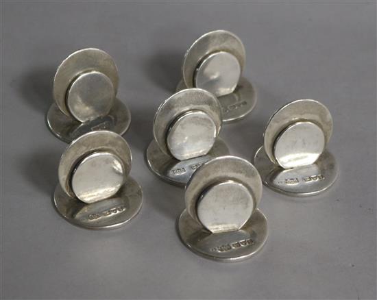 A set of six Edwardian silver disc menu holders by Sampson Mordan & Co, Chester, 1903, base dia. 33mm.